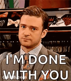 A Man In A Suit And Tie Is Saying `` I 'M Done With You '' GIF