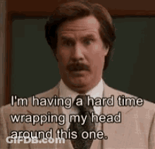 A Man In A Suit And Tie Is Saying `` I 'M Having A Hard Time Wrapping My Head Around This One '' . GIF