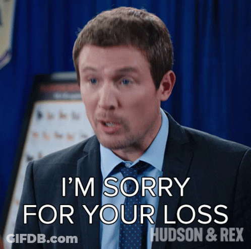 A Man In A Suit And Tie Is Saying I 'M Sorry For Your Loss GIF