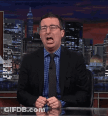 A Man In A Suit And Tie Is Saying " It 'S Not Fair " GIF