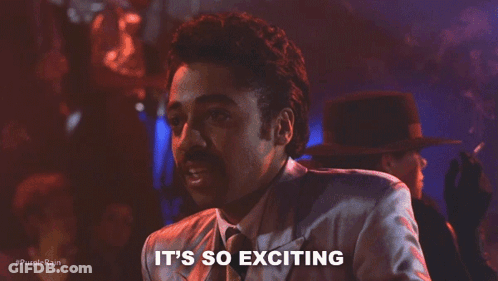 A Man In A Suit And Tie Is Saying It 'S So Exciting In A Club . GIF