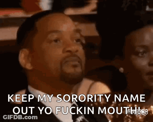 A Man In A Suit And Tie Is Saying " Keep My Sorority Name Out Yo Fuckin Mouth " GIF