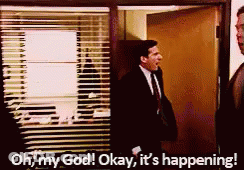 A Man In A Suit And Tie Is Saying Oh My God Okay It 'S Happening . GIF