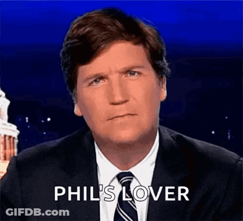 A Man In A Suit And Tie Is Saying Phil 'S Lover GIF