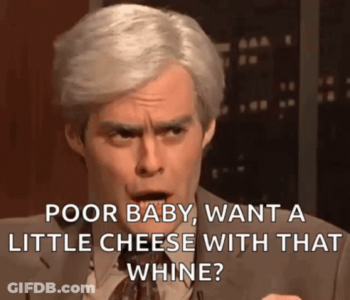 A Man In A Suit And Tie Is Saying Poor Baby , Want A Little Cheese With That Whine . GIF