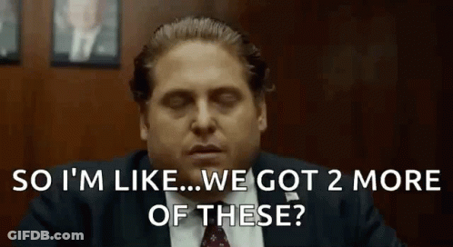 A Man In A Suit And Tie Is Saying `` So I 'M Like ... We Got 2 More Of These '' GIF