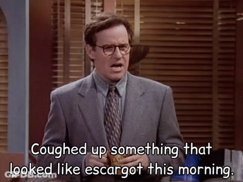A Man In A Suit And Tie Is Saying Something That Looked Like Escargot This Morning GIF