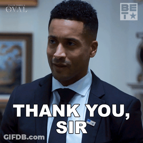 A Man In A Suit And Tie Is Saying Thank You Sir GIF