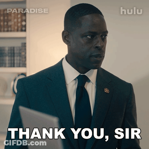 A Man In A Suit And Tie Is Saying " Thank You Sir " GIF