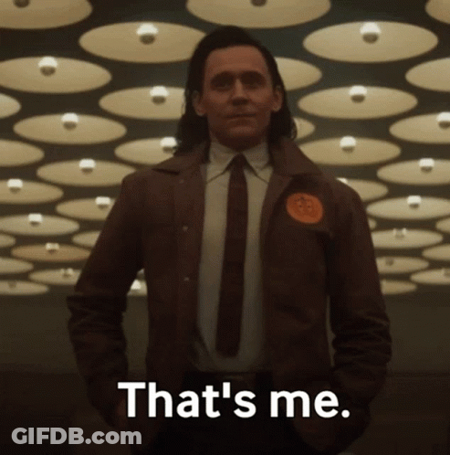 A Man In A Suit And Tie Is Saying That 'S Me . GIF