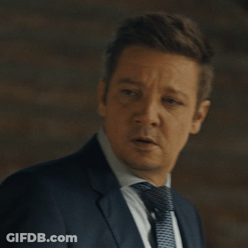 A Man In A Suit And Tie Is Saying " That 'S The Spirit " GIF