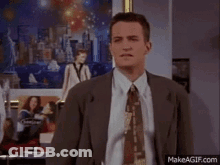 A Man In A Suit And Tie Is Saying " This Is Great I 'Ll Give You A Call We Should Do It Again " GIF
