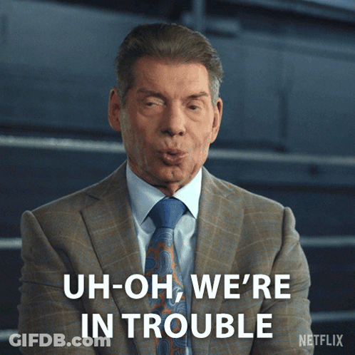 A Man In A Suit And Tie Is Saying " Uh-Oh We 'Re In Trouble " GIF