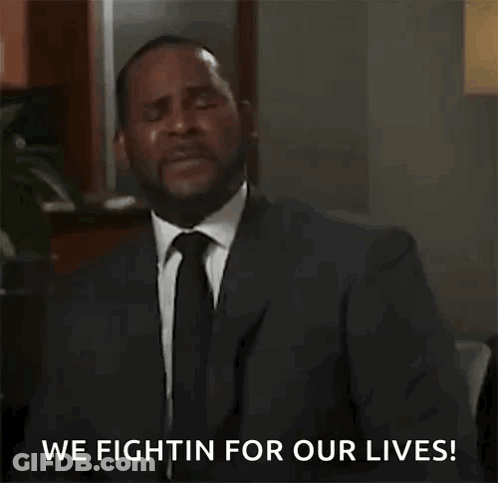 A Man In A Suit And Tie Is Saying `` We Fightin For Our Lives ! '' GIF