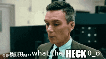 A Man In A Suit And Tie Is Saying What The Heck O GIF