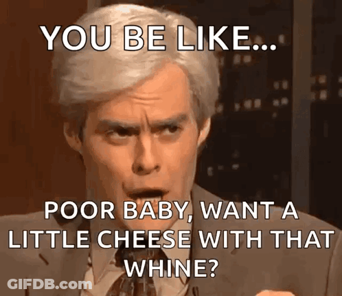 A Man In A Suit And Tie Is Saying You Be Like Poor Baby Want A Little Cheese With That Whine ? GIF