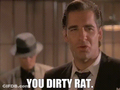 A Man In A Suit And Tie Is Saying " You Dirty Rat " GIF