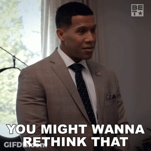 A Man In A Suit And Tie Is Saying You Might Wanna Rethink That GIF