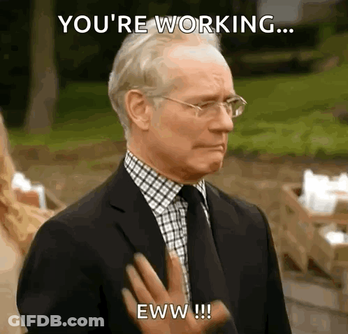A Man In A Suit And Tie Is Saying You 'Re Working Eww ! GIF