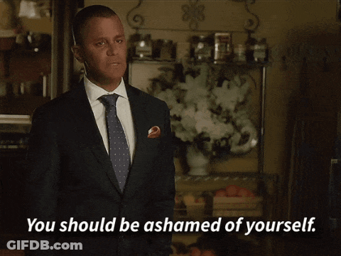 A Man In A Suit And Tie Is Saying " You Should Be Ashamed Of Yourself " GIF