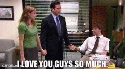A Man In A Suit And Tie Is Shaking Hands With A Woman And A Man In A Shirt And Tie . GIF