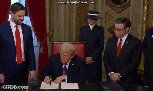 A Man In A Suit And Tie Is Signing A Document While Another Man Watches GIF