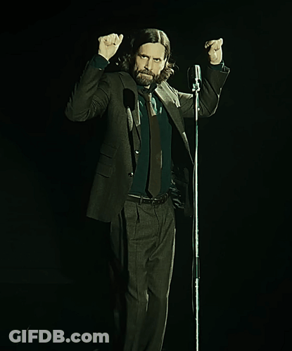 Man In Suit Singing Into Microphone GIF