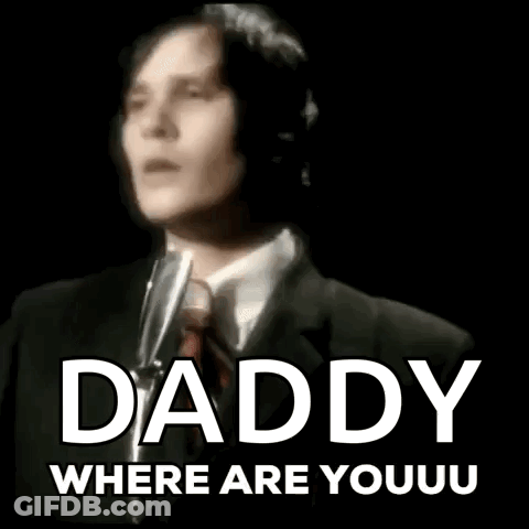 A Man In A Suit And Tie Is Singing Into A Microphone With The Words Daddy Where Are Youu Written Below Him GIF