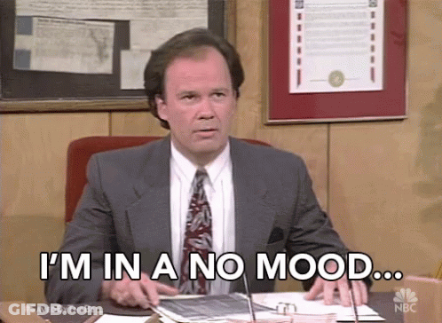 Man In Suit And Tie Sitting At Desk I M In A No Mood GIF