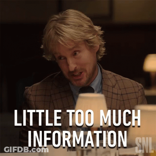 A Man In A Suit And Tie Is Sitting At A Table With The Caption Little Too Much Information Snl GIF