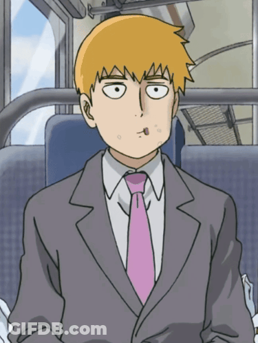 A Man In A Suit And Tie Is Sitting In A Bus GIF