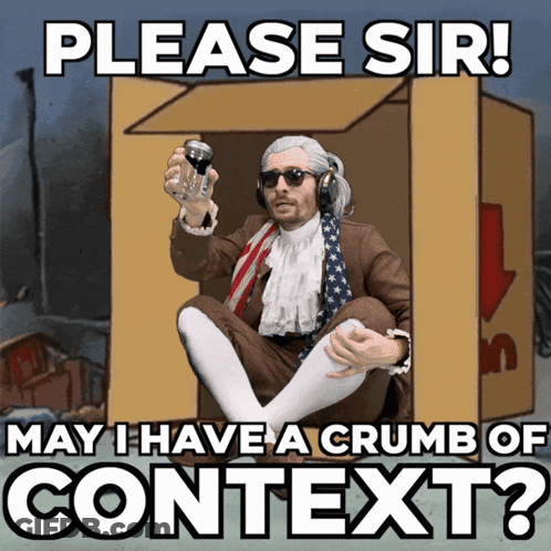 A Man In A Suit And Tie Is Sitting In A Cardboard Box With The Words Please Sir May I Have A Crumb Of Context? GIF