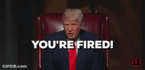 A Man In A Suit And Tie Is Sitting In A Chair And Says " You 'Re Fired " GIF