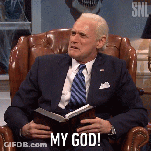 Man In Suit Holding Book Saying My God GIF