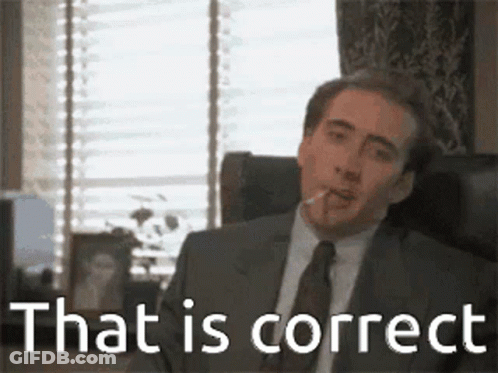 A Man In A Suit And Tie Is Sitting In A Chair With A Cigarette In His Mouth And The Words `` That Is Correct '' . GIF