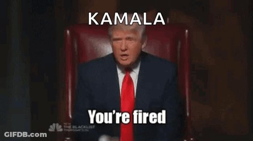 A Man In A Suit And Tie Is Sitting In A Chair With The Words Kamala You 'Re Fired Below Him GIF