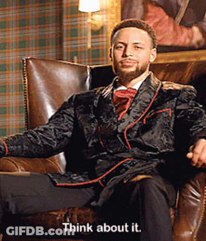 A Man In A Suit And Tie Is Sitting In A Chair With The Words Think About It Below Him GIF