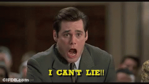 A Man In A Suit And Tie Is Sitting In Front Of A Crowd And Says `` I Can 'T Lie '' . GIF