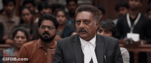 Man In Suit And Tie Speaking To Crowd GIF