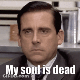 A Man In A Suit And Tie Is Sitting In Front Of A Sign That Says " My Soul Is Dead " GIF