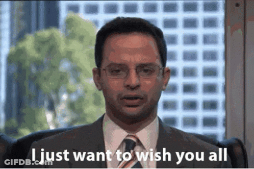 A Man In A Suit And Tie Is Sitting In Front Of A Window And Says " I Just Want To Wish You All " GIF