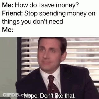 A Man In A Suit And Tie Is Sitting In Front Of A Window And Talking To A Friend . GIF