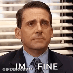 A Man In A Suit And Tie Is Sitting In Front Of A Window With Blinds And Saying `` Im ... Fine '' . GIF