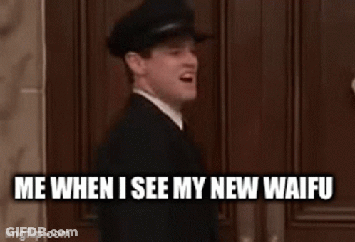 A Man In A Suit And Tie Is Sitting In Front Of A Wooden Door . GIF