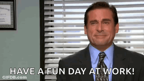 A Man In A Suit And Tie Is Smiling And Saying `` Have A Fun Day At Work '' . GIF