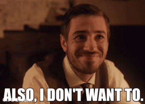 A Man In A Suit And Tie Is Smiling And Says Also I Don 'T Want To GIF