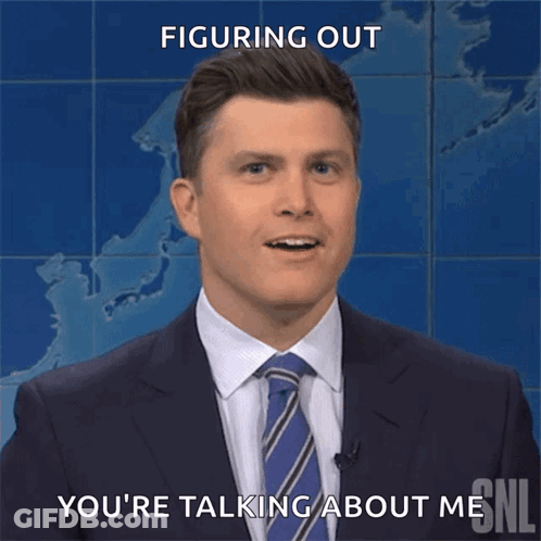 A Man In A Suit And Tie Is Smiling And Says " Figuring Out You 'Re Talking About Me " GIF