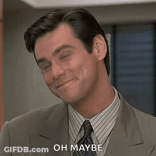 A Man In A Suit And Tie Is Smiling And Says " Oh Maybe " GIF