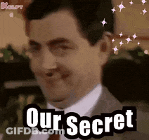 A Man In A Suit And Tie Is Smiling And Says " Our Secret " GIF