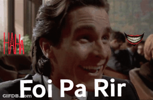 A Man In A Suit And Tie Is Smiling With The Words Foi Pa Rir Behind Him GIF